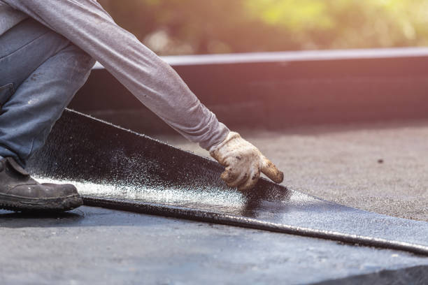 Professional Waterproofing technician working in Cook Springs, AL